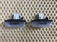 Фонарь подсветки номера на Nissan Tiida C11 — фото 2