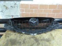 Решетка радиатора Mazda CX 5 2012> (ДО 2015 ГОДА KD4550712) — фото 1