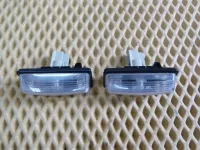 Фонарь подсветки номера на Nissan Teana J32 — фото 2