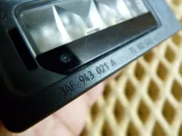 Фонарь подсветки номера на Volkswagen Passat B7 — фото 5
