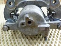 Суппорт передний левый на Toyota Corolla E150 — фото 13