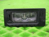 Фонарь подсветки номера на Volkswagen Polo Mk5 — фото 4