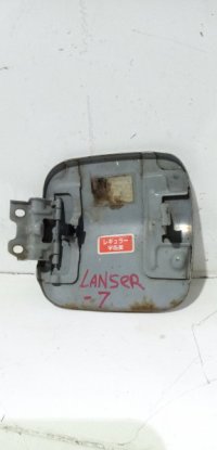 Лючок бензобака на Mitsubishi Mirage — фото 2