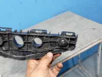 Кронштейн переднего бампера правый на Toyota Corolla E150 — фото 2