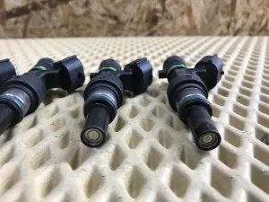 Форсунка инжекторная электрическая Nissan Cube (Z12) 2008-2020 Nissan Micra (K12E) 2002-2010 Nissan Note (E11) 2006-2013 Nissan NV200 (M20) 2009> Nissan Qashqai+2 (JJ10) 2008-2014 Nissan Qashqai (J10) 2006-2014 Nissan Tiida (C11) 2007-2014 (КОМПЛЕКТ 16600ED000) — фото 3