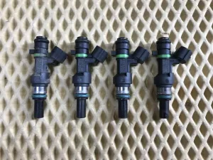 Форсунка инжекторная электрическая Nissan Cube (Z12) 2008-2020 Nissan Micra (K12E) 2002-2010 Nissan Note (E11) 2006-2013 Nissan NV200 (M20) 2009> Nissan Qashqai+2 (JJ10) 2008-2014 Nissan Qashqai (J10) 2006-2014 Nissan Tiida (C11) 2007-2014 (КОМПЛЕКТ 16600ED000) — фото 1