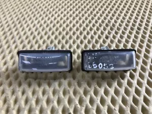 Фонарь подсветки номера Nissan Almera (G15) 2013-2018 — фото 1