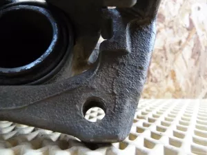 Суппорт тормозной передний левый Nissan Almera (G15) 2013-2018 (4101100Q0F) — фото 3