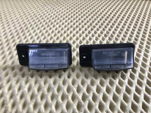 Фонарь подсветки номера Nissan Murano (Z51) 2008-2015 — фото 1