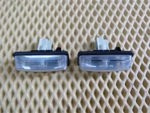 Фонарь подсветки номера Nissan Teana J32 2008-2013 (265109Y00A) — фото 2