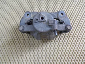 Суппорт тормозной передний левый Toyota Corolla E15 2006-2013 (4775012A10) — фото 9