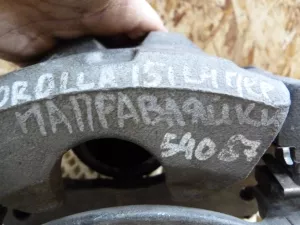 Суппорт тормозной передний левый Toyota Corolla E15 2006-2013 (4775012A10) — фото 7