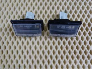 Фонарь подсветки номера Nissan Fuga PY50 2004-2009 (26510EG000) — фото 2