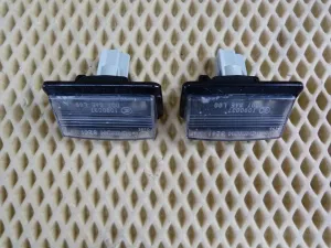 Фонарь подсветки номера Nissan Fuga PY50 2004-2009 (26510EG000) — фото 2