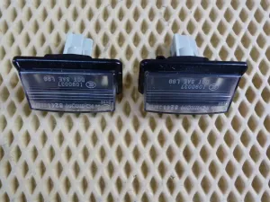 Фонарь подсветки номера Nissan Fuga PY50 2004-2009 (26510EG000) — фото 2