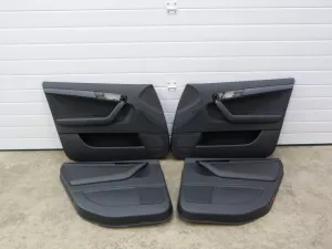 Комплект обшивок двери Audi A3 [8PA] Sportback 2004-2013 (8P4867103L 8P4867104G 8P4867303P 8P4867304P 8P4971036J 8P4971035P 8P4971693T) — фото 1