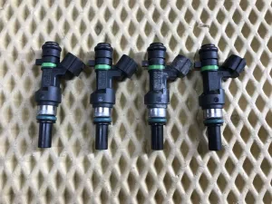 Форсунка инжекторная электрическая Nissan Cube (Z12) 2008-2020 Nissan Micra (K12E) 2002-2010 Nissan Note (E11) 2006-2013 Nissan NV200 (M20) 2009> Nissan Qashqai+2 (JJ10) 2008-2014 Nissan Qashqai (J10) 2006-2014 Nissan Tiida (C11) 2007-2014 (КОМПЛЕКТ 16600ED000) — фото 1