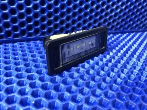 Фонарь подсветки номера BELGEE X50 / Geely Coolray SX11 — фото 2