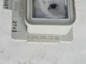 Подсветка номера Mercedes E220 D Amg Рестайл W213 OM654 2021 — фото 1