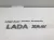 Эмблема на крышку багажника на Lada Xray